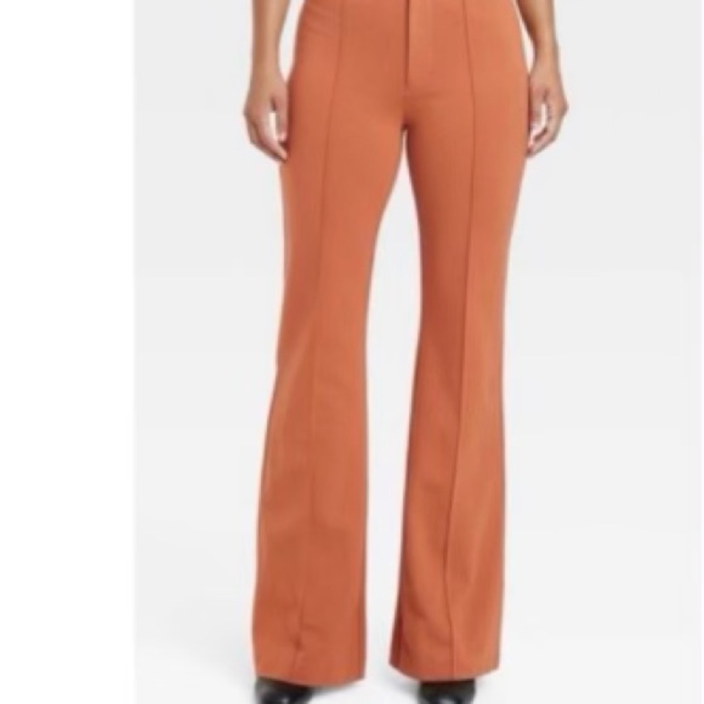 NWOT a new day  High waisted with Flare orange pants 
Stretchy material, size 4